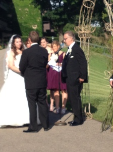 Christina & Adam Lewis along with Adam's father Larry who was also the officiant.